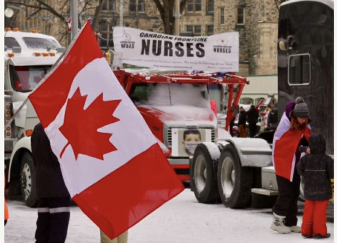 Canadian flag and Canadian Frontline Nurses truck during the Freedom Convoy