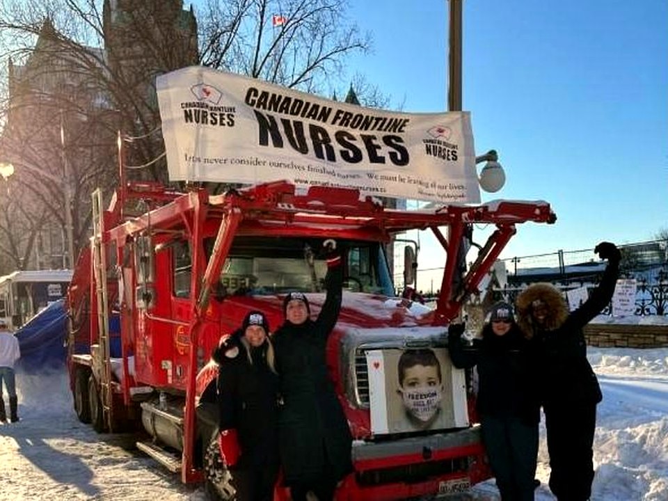 Canadian Frontline Nurses beside the truck near Parliament
